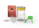 Veggie Fermenter kit: Kefirko jar, yellow lid, spring, green masher, and instruction booklet.