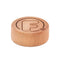 tapon circular de madera con logo flaska vista desde arriba