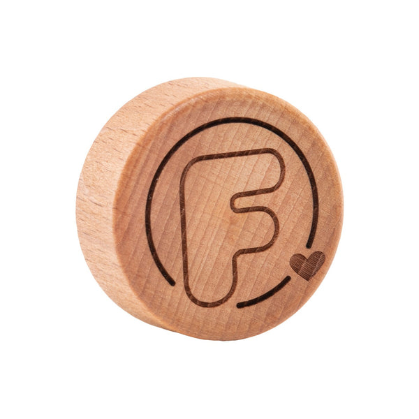 tapon circular de madera con logo flaska
